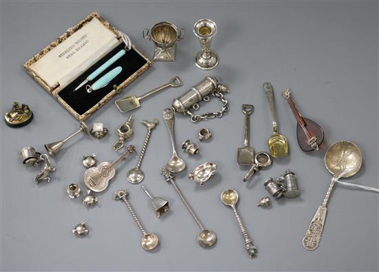 A miniature silver and guilloche enamel pencil and penknife set, cased, sundry miniature novelties, etc.